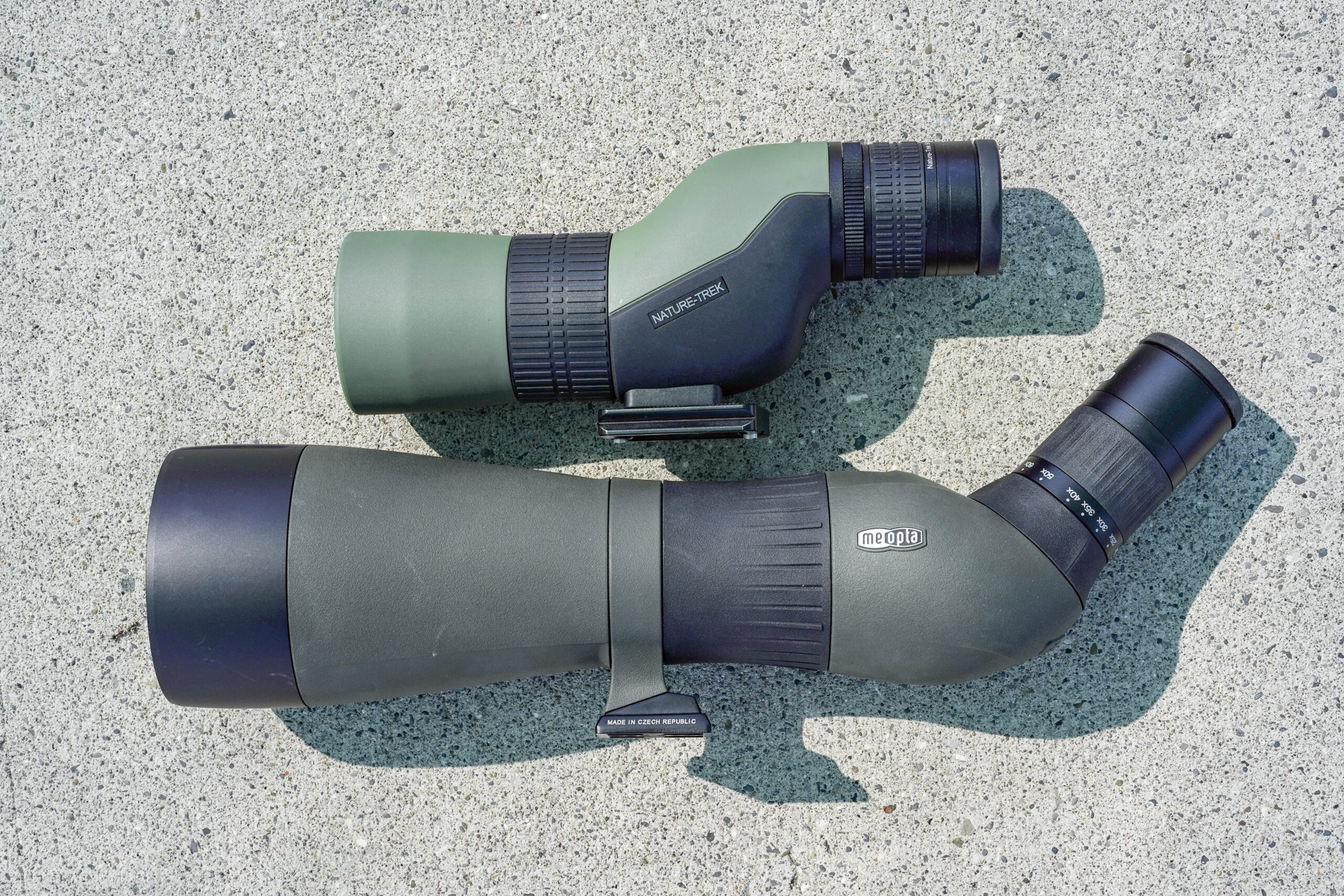 A compact spotter versus a full size spotter